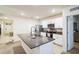 Bright kitchen featuring a central island, modern appliances, and ample cabinet space at 2723 Elmbrooke Way, Edgewater, FL 32141