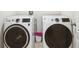 Modern laundry room showcasing a front load washer and dryer at 2723 Elmbrooke Way, Edgewater, FL 32141