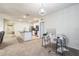 Open-concept layout showcasing seamless transition from living to kitchen area at 2723 Elmbrooke Way, Edgewater, FL 32141