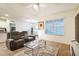 Inviting living area with a large window, plush seating, and stylish accents at 2723 Elmbrooke Way, Edgewater, FL 32141