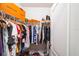 Organized walk-in closet with shelving, hanging space, and storage for shoes at 2723 Elmbrooke Way, Edgewater, FL 32141