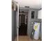 Utility room with water heater and fuse box at 4801 Avon St, Lake Wales, FL 33859