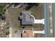 Aerial view of a single-story home with gray roof, long concrete driveway, and lawn at 524 Marion Oaks Blvd, Ocala, FL 34473