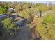 Beautiful lakefront property featuring mature trees and a screened-in pool, perfect for Florida living at 5261 Waterwood Dr, Bartow, FL 33830