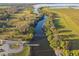 Aerial view of a boat launch with docks providing access to the lake at 5261 Waterwood Dr, Bartow, FL 33830