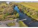 Aerial view of a boat launch with docks providing access to the lake at 5261 Waterwood Dr, Bartow, FL 33830