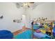 Colorful bedroom with wood floors and lots of room for activities at 5261 Waterwood Dr, Bartow, FL 33830
