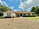 Charming single story home with well-maintained landscaping and a welcoming front porch at 5261 Waterwood Dr, Bartow, FL 33830