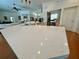 Kitchen island with a stone countertop and stainless steel sink at 5261 Waterwood Dr, Bartow, FL 33830