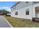 View of house with lush green lawn, well maintained shrubs and street view at 1324 Painted Bunting Ave, Winter Garden, FL 34787