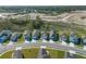 Aerial view of a modern residential development with well-maintained lawns and streetscapes at 2530 Linda Knoll Ln, Bartow, FL 33830