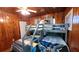 Unique bunk beds and wood paneling create a fun and cozy sleeping space at 3254 E Canal Ln, Fort Meade, FL 33841