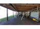 Boat storage and equipment in a covered, open-sided storage structure at 3254 E Canal Ln, Fort Meade, FL 33841