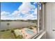 Nice lake views from the unit of the community pool, shuffleboard court, and boat docks at 700 Mirror Nw Ter # 505, Winter Haven, FL 33881