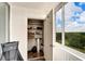 Well organized closet with shelving and window view at 700 Mirror Nw Ter # 505, Winter Haven, FL 33881