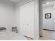 Cozy bedroom with closet, mirror, and view of another room at 1741 Hill Top Dr, Dundee, FL 33838