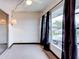 Balcony overlooking the parking area with mature trees at 333 Lake Howard Dr Nw # 314D, Winter Haven, FL 33880