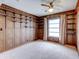 Bedroom featuring built-in shelving and carpet flooring at 333 Lake Howard Dr Nw # 314D, Winter Haven, FL 33880