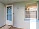 Condo front entrance featuring unit number 3140 and a small window at 333 Lake Howard Dr Nw # 314D, Winter Haven, FL 33880
