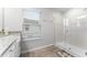 Modern bathroom featuring a glass-enclosed shower, granite countertop, and a bright, airy feel at 3798 Plainview Dr, Orlando, FL 32824