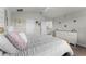 Comfortable bedroom with a view to the en-suite, featuring neutral colors and a spacious layout at 3798 Plainview Dr, Orlando, FL 32824