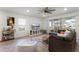 Inviting living room with large windows and stylish furnishings at 3798 Plainview Dr, Orlando, FL 32824