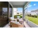Screened patio features outdoor seating, and a tranquil backyard view at 3798 Plainview Dr, Orlando, FL 32824