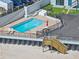 Aerial shot of the pool area, showing the proximity of the beach and access stairs at 1404 N Atlantic Ave # 270, Daytona Beach, FL 32118