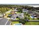 Aerial view of a home with a screened-in pool and lush backyard at 5029 Sheffield Rd, Lakeland, FL 33813