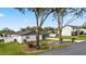 Landscaped front yard and long driveway at 5029 Sheffield Rd, Lakeland, FL 33813