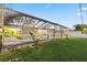 A screened-in pool area with tropical greenery at 5029 Sheffield Rd, Lakeland, FL 33813