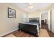 This bedroom features neutral walls, ceiling fan, and natural light at 1724 Holton Rd, Lakeland, FL 33810