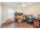 Bright bedroom interior featuring a ceiling fan and ample storage space at 1724 Holton Rd, Lakeland, FL 33810