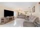 Bright living room featuring tile floors and neutral colored walls at 1724 Holton Rd, Lakeland, FL 33810