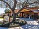 The Studio Theatre Tierra del Sol entrance surrounded by lush landscaping and mature trees at 2009 Salinas Ave, Lady Lake, FL 32159