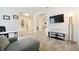 Inviting living room showcasing stylish plank flooring and arched doorways leading to other living spaces at 2163 Plantation Oak Dr, Orlando, FL 32824