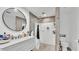 Bathroom features a glass shower, modern fixtures, and vanity at 5152 Belmont Park Way, Mulberry, FL 33860