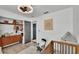 Cozy bedroom featuring closet, stylish dresser, with wood-look flooring and an inspirational wall print at 5152 Belmont Park Way, Mulberry, FL 33860