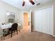 Bedroom boasts a vanity, and a large closet for ample storage at 6455 Sedgeford Dr, Lakeland, FL 33811