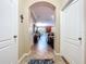 Hallway view showing connecting rooms, highlighting the open floor plan of the house at 6455 Sedgeford Dr, Lakeland, FL 33811