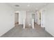 Open hallway with neutral carpet, recessed lighting, and white trim at 2122 Rosewood Dr, Bartow, FL 33830