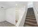 Carpeted staircase with white walls leading to upper level at 2122 Rosewood Dr, Bartow, FL 33830