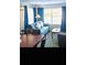 Inviting living area with a comfortable sofa, natural light from the window, and tasteful decor at 6337 Parc Corniche Dr # 2101, Orlando, FL 32821
