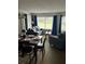 Comfortable and quaint living room with plush seating and natural light from multiple windows at 6337 Parc Corniche Dr # 2101, Orlando, FL 32821