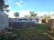 Backyard featuring an above ground pool and a shed for extra storage at 663 Hager St, Deltona, FL 32725