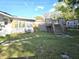 Backyard features a deck, above-ground pool, and shed for extra storage at 663 Hager St, Deltona, FL 32725