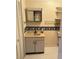 Bathroom with a goose-themed border, mirrored medicine cabinet, and vanity sink at 102 Center Sw St, Winter Haven, FL 33880