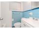 Bathroom with tiled walls, toilet, and vanity at 211 W Valencia St, Lakeland, FL 33805