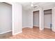 Bedroom with multiple closets, ceiling fan, and ample space at 211 W Valencia St, Lakeland, FL 33805