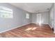 Large bedroom with multiple windows and ceiling fan at 211 W Valencia St, Lakeland, FL 33805